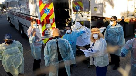 Video thumbnail: PBS NewsHour News Wrap: U.S. COVID cases rise 80 percent in 2 weeks