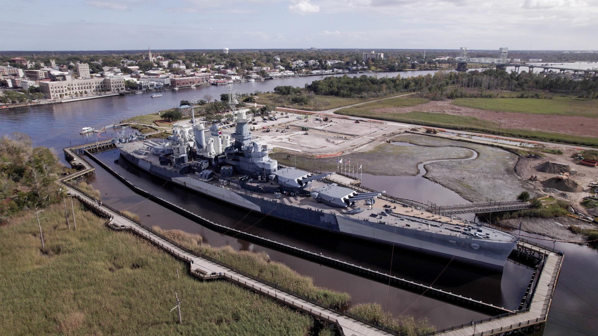 An image of the USS North Carolina off the coast of Wilmington.