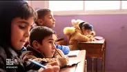 Air strikes don't deter these Syrian school-goers