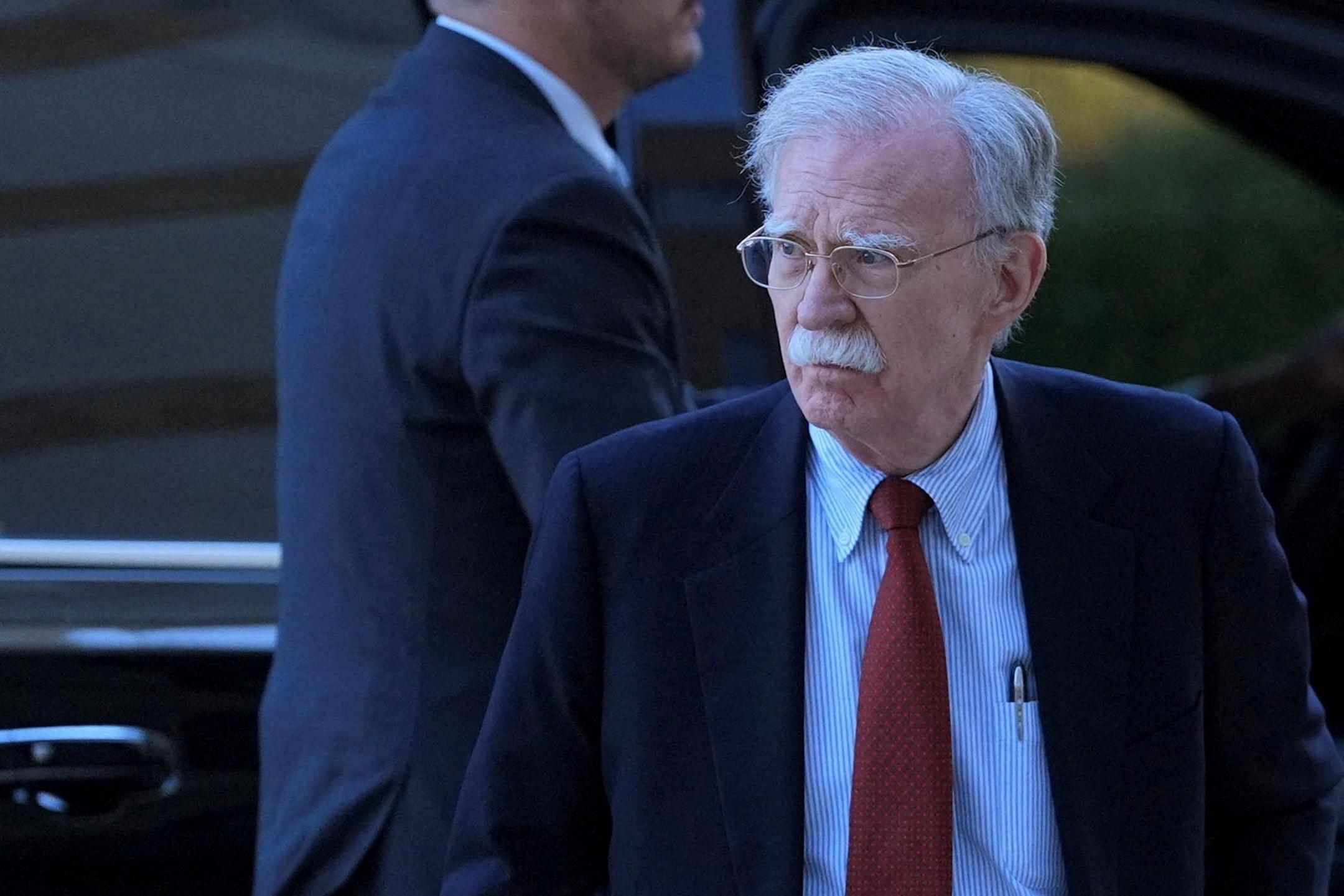News Wrap: Former Trump adviser John Bolton to plead guilty over classified information