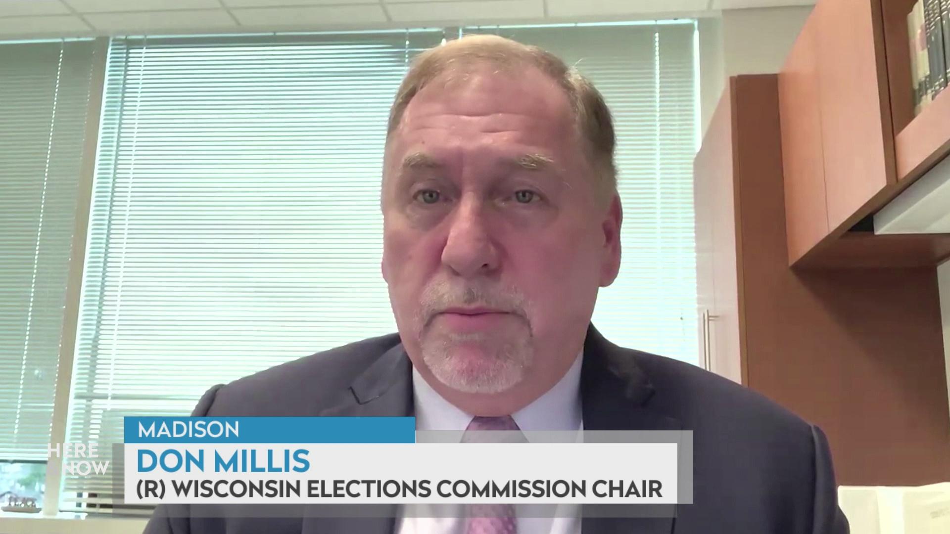 A still image from a video shows Don Millis seated in front of wooden cabinets and a window with blinds, with a graphic at bottom reading 'Madison,' 'Don Millis' and '(R) Wisconsin Elections Commission Chair.'