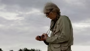 In the field with tarantula researcher