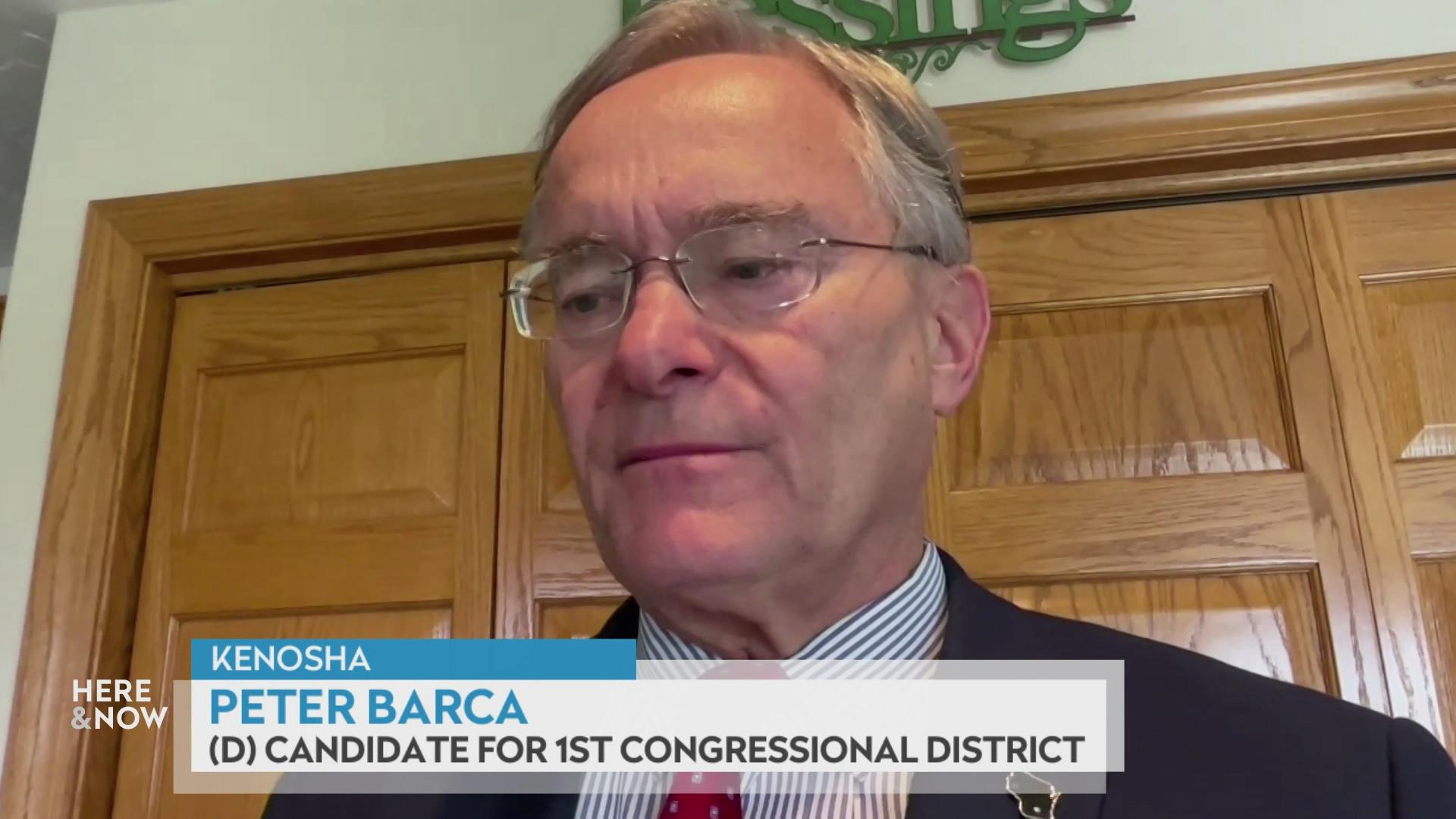 A still image from a video shows Peter Barca in front of wooden doors with a graphic at bottom reading 'Kenosha,' 'Peter Barca' and '(D) Candidate for 1st Congressional District.'