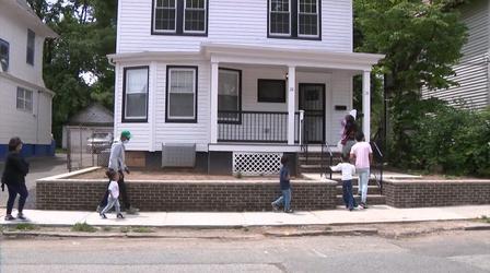 Newark families win housing lottery, get keys to homes