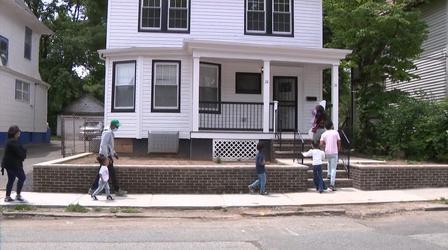 Video thumbnail: NJ Spotlight News Newark families win housing lottery, get keys to homes