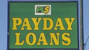 Pritzker Signs Legislation to Cap High-Interest Payday Loans