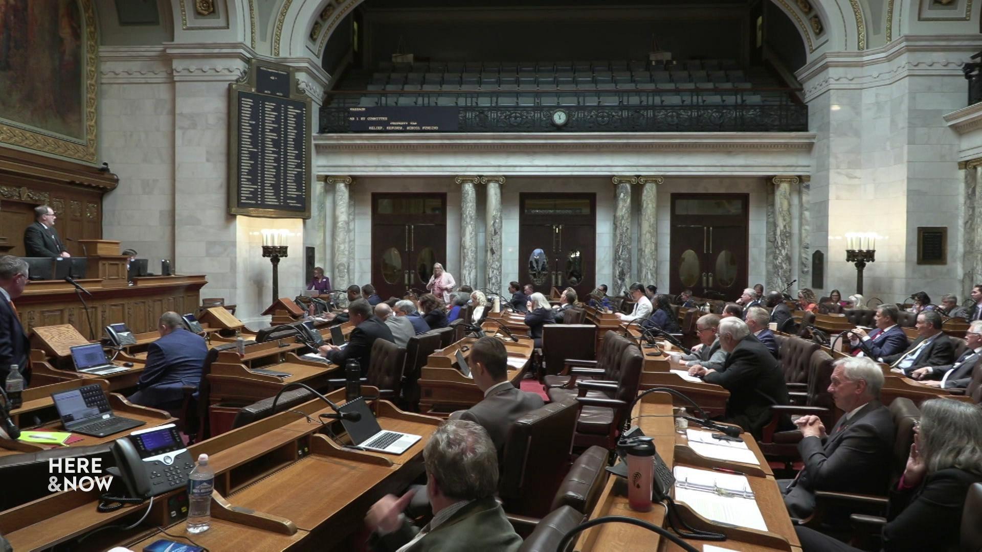 A still image shows an active session in the Wisconsin state Legislature.