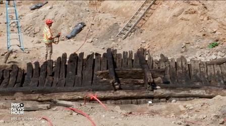 Video thumbnail: PBS NewsHour Old buried ships unearth this city’s seafaring past