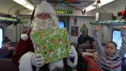Kids ride the rails with Santa Claus at annual event