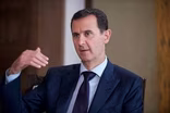 News Wrap: Syria sentences al-Assad to death in absentia