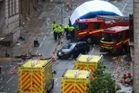 News Wrap: Driver plows into crowd of people in Liverpool