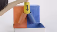 Cómo hacer un juego de canicas con una caja reciclada