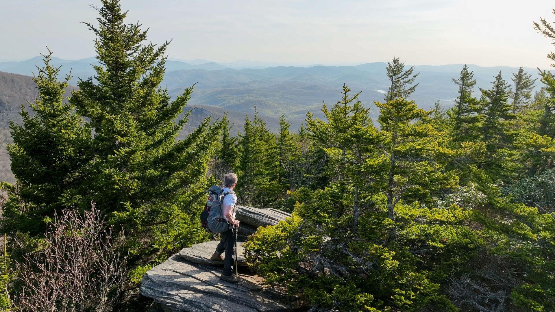 Hiker, Randy Boone, on the peak of Grandfather Mountain.