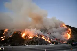 Windy conditions keep California burning--and its power out