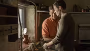 Man In An Orange Shirt