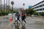 News Wrap: Biden tours flooding, storm damage in California
