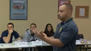 Police officers learn de-escalation techniques