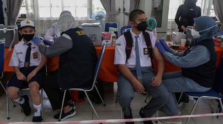 Video thumbnail: PBS NewsHour China's vaccine faces scrutiny as vaccinated Indonesians die