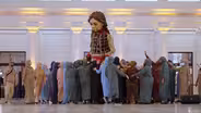 Giant Child Refugee Puppet Little Amal Learns ASL to Find Home