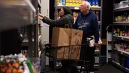 Cuts to SNAP benefits push many to seek help from food banks