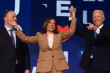 Biden passes torch to Harris on emotional first night of DNC