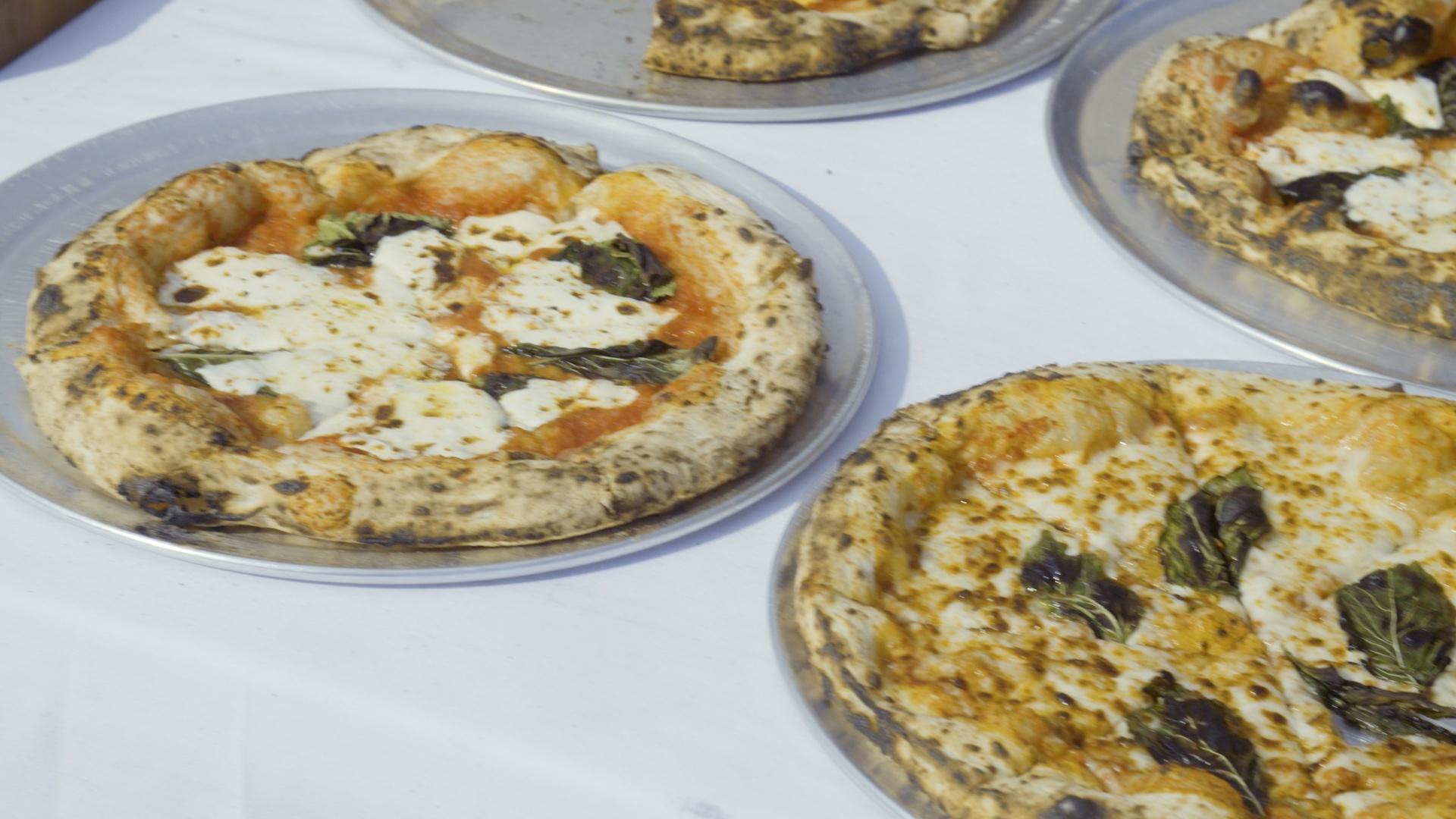 John tastes a 100-year-old family tradition that makes a great pizza!