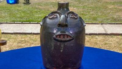 Appraisal: Davis Pennington Brown Stoneware Face Jug, ca. 1917