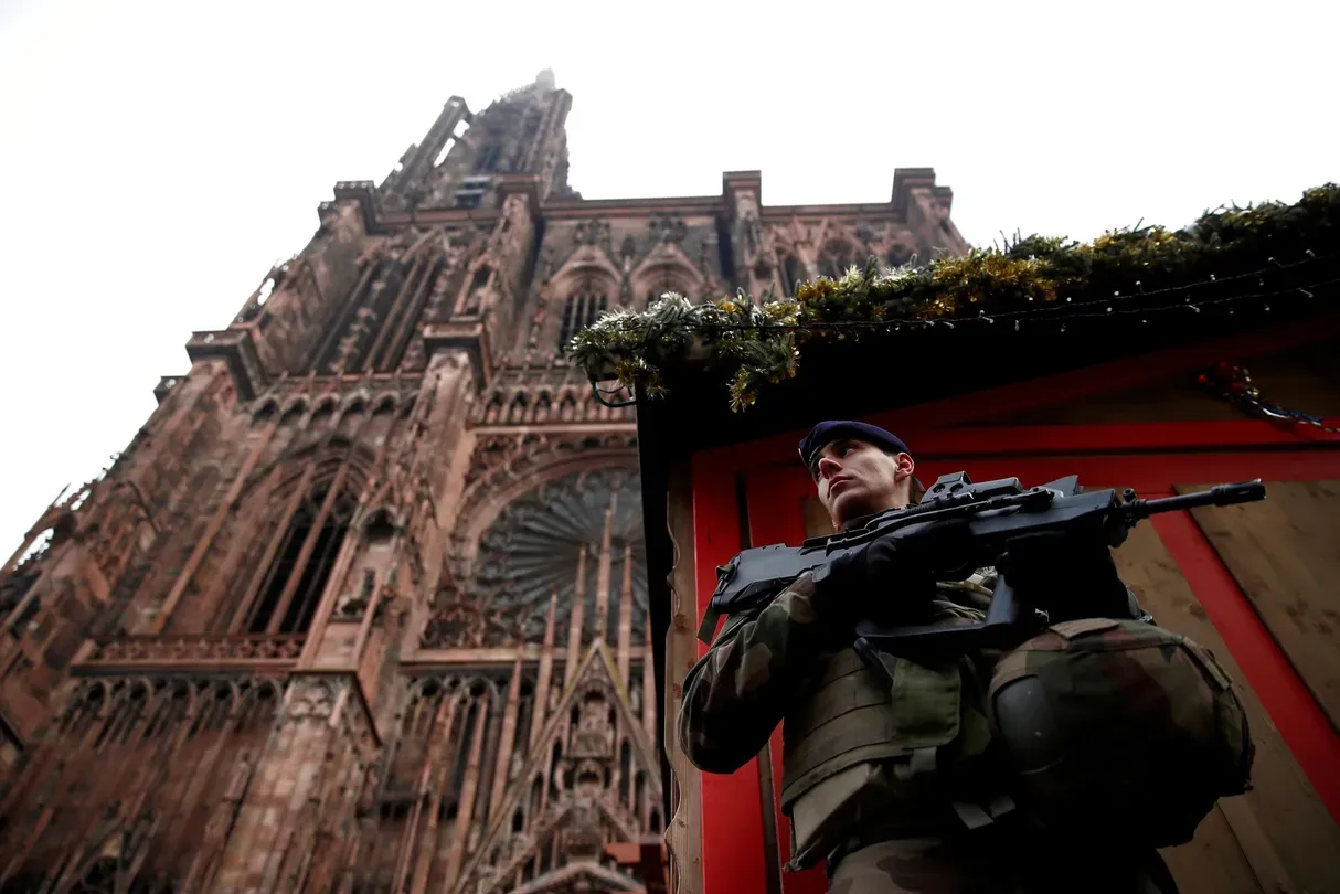 News Wrap: Gunman in French market attack still at large