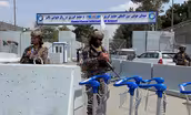 Biden defends Afghanistan exit as Taliban celebrates it