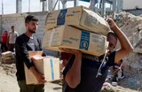 Relief groups ready to surge aid to Gaza as ceasefire holds