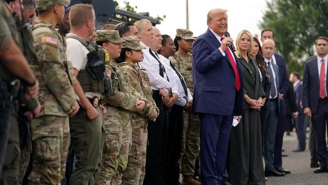 News Wrap: Pentagon says troops will carry firearms in D.C.