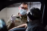 News Wrap: Pentagon to mobilize troops for vaccinations