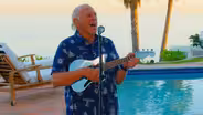 Jimmy Buffett Performs "This Land is Your Land"