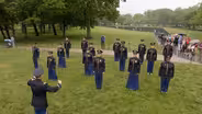 The US Army Field Band's Soldier's Chorus performs "Bridge Over Troubled Water"
