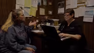 Dr. Kinsell Meets with a Patient