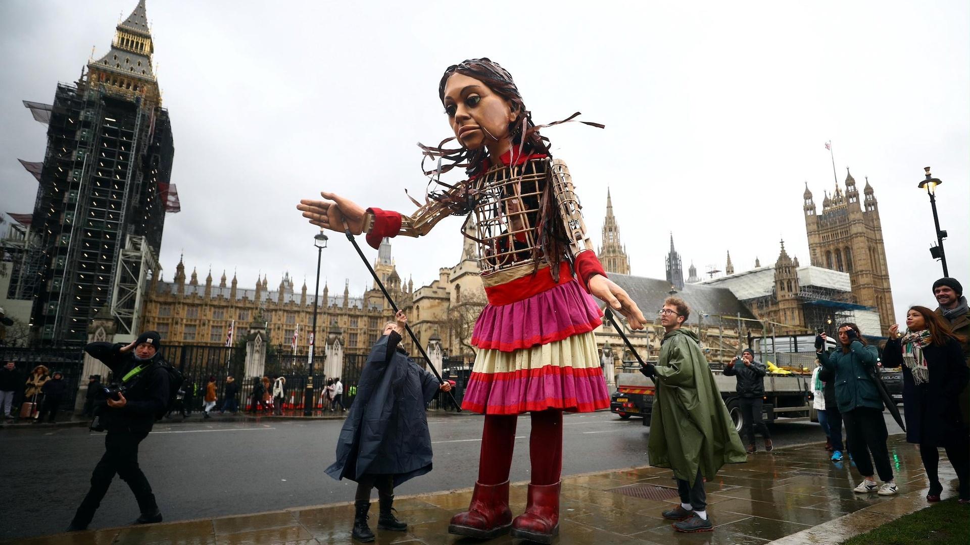 Giant puppet in NYC raises awareness of refugee crisis PBS NewsHour