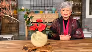 Ikebana featuring Camellias, Sharpening Tools, and Magnolias