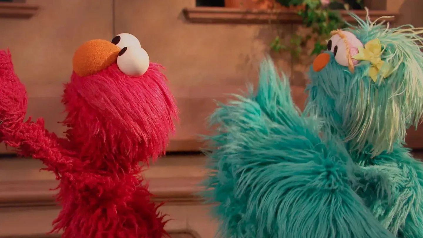 Rosita and Elmo Teach Yoga