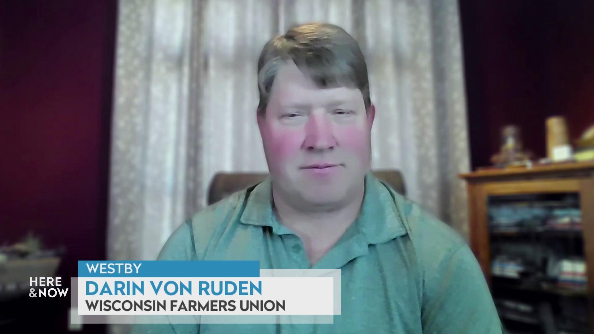 A still image shows Darin Von Ruden seated in front of a window with flower-printed curtains, with a caption at the bottom that reads 'Westby,' 'Darin Von Ruden' and 'Wisconsin Farmers Union.'