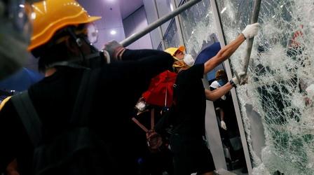 Hong Kong protesters storm buildings, clash with police
