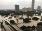 Historic flooding inundates Texas, hampering rescue efforts