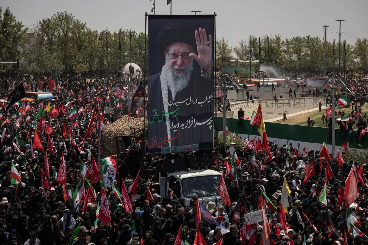 News Wrap: Funeral held for Iran's late Supreme Leader