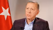 Turkey’s Erdogan says he trusts Russia as much as the West