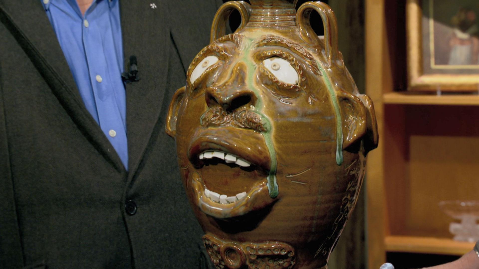Intricate table; two-faced politician vase; mourning jewelry; ceremonial machete.