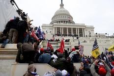 What do the Jan. 6th attacks tell us about our democracy?: asset-mezzanine-16x9