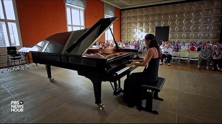 Video thumbnail: PBS NewsHour How a Rapa Nui pianist is bringing music education home