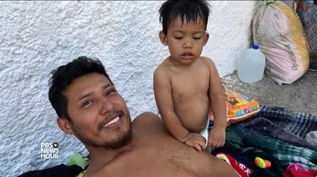 Video thumbnail: PBS NewsHour Migrant seeking asylum says his toddler was taken away
