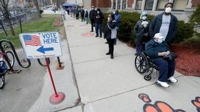 Video thumbnail: PBS NewsHour 2 views on Wisconsin’s holding in-person voting Tuesday