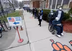 2 views on Wisconsin’s holding in-person voting Tuesday
