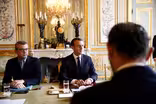 News Wrap: Paris reels from worst riots in 50 years